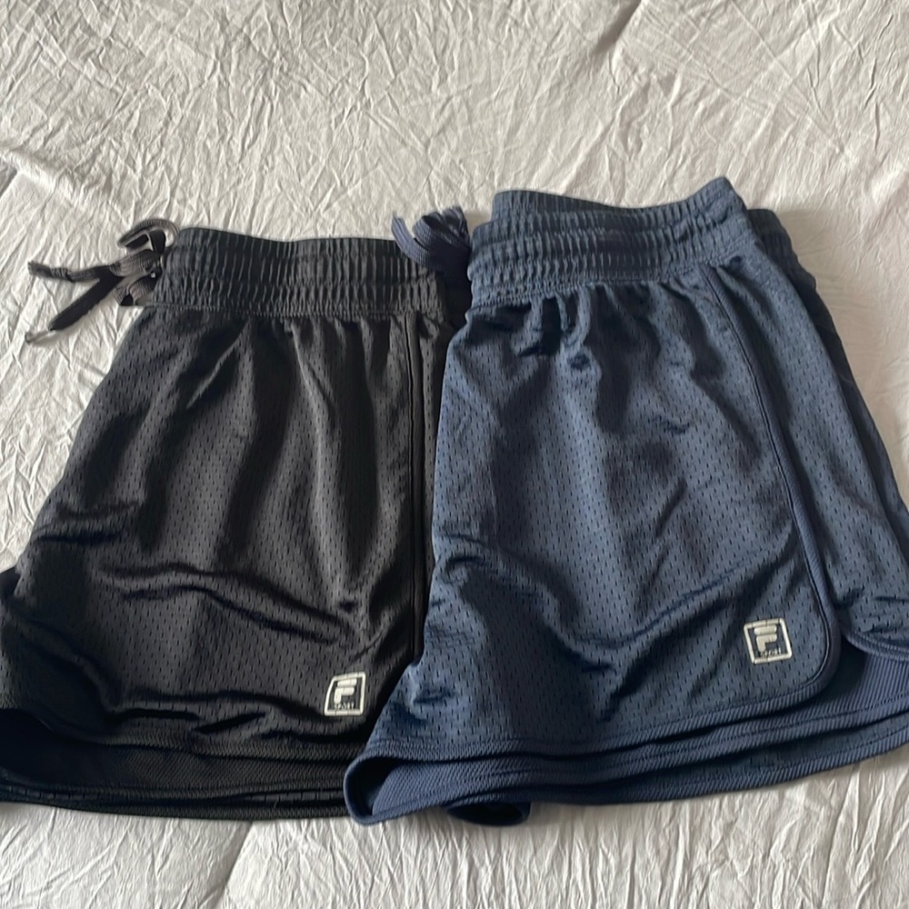 Set of two Fila running shorts. One navy, one black.